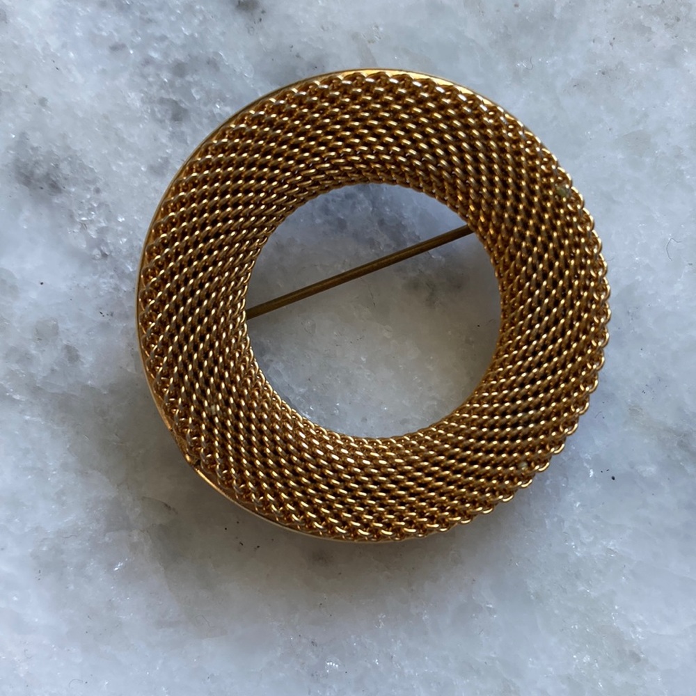 Elegant Gold-Tone Circular Brooch